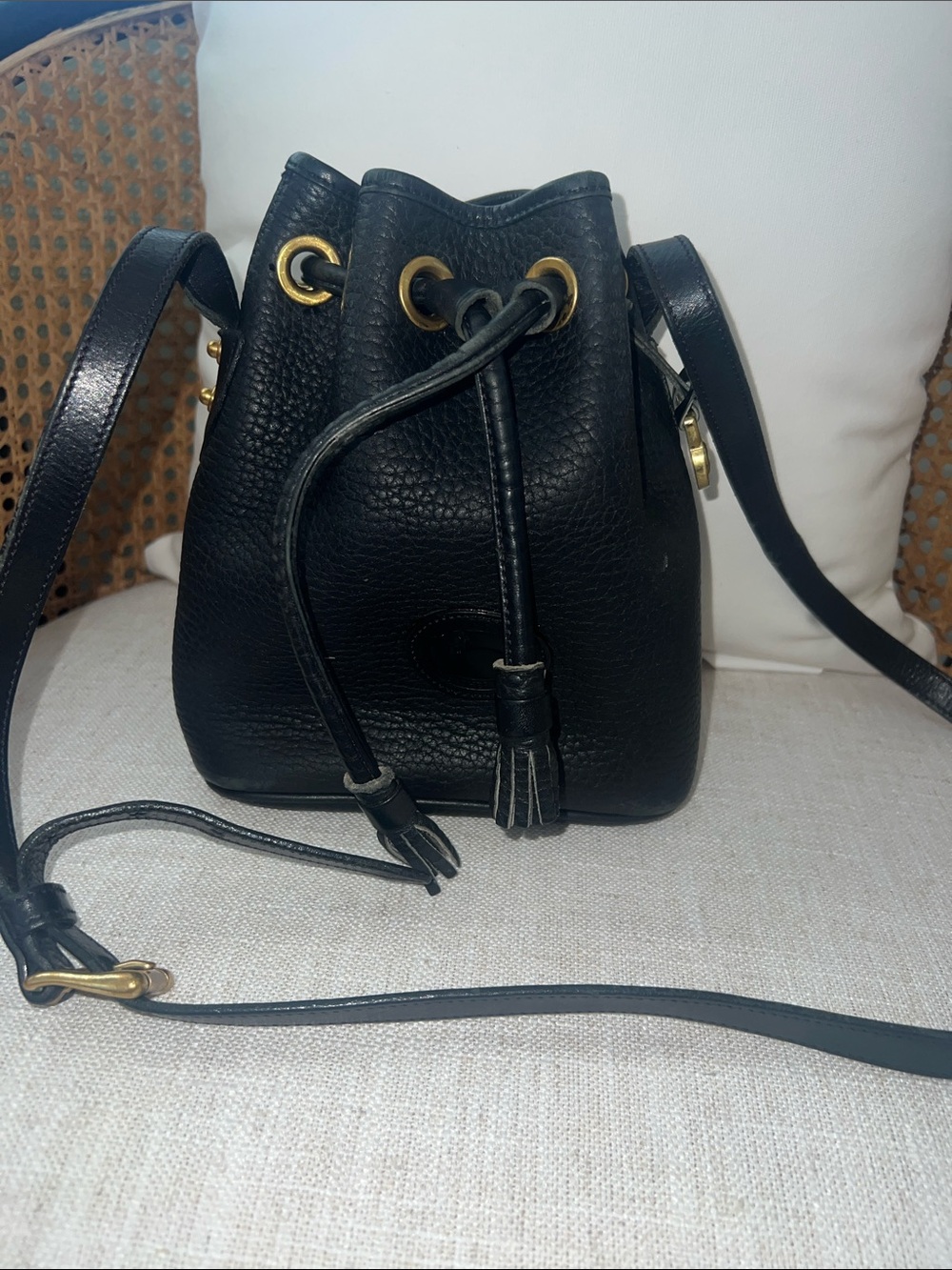 Leather bucket bag, Dooney & Bourke All-Weather Leather Mini Drawstring